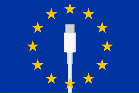 A USB-C cable plug over the EU flag